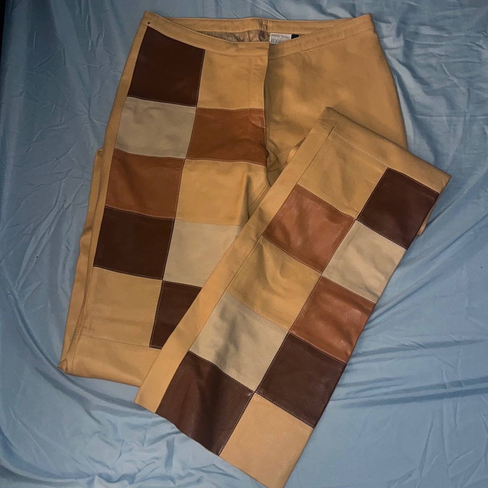 Flare, leather, brown palette, colored pants. Never worn.